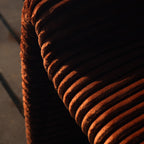 Close view of the wide, heavy rust corduroy cord on the Bough Chair.