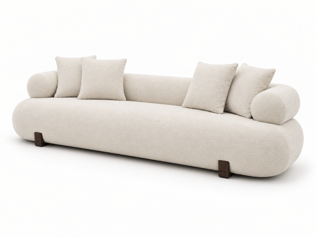 Gloam Sofa — three-quarter view from the right, showing the rolled arm and the softened edges.