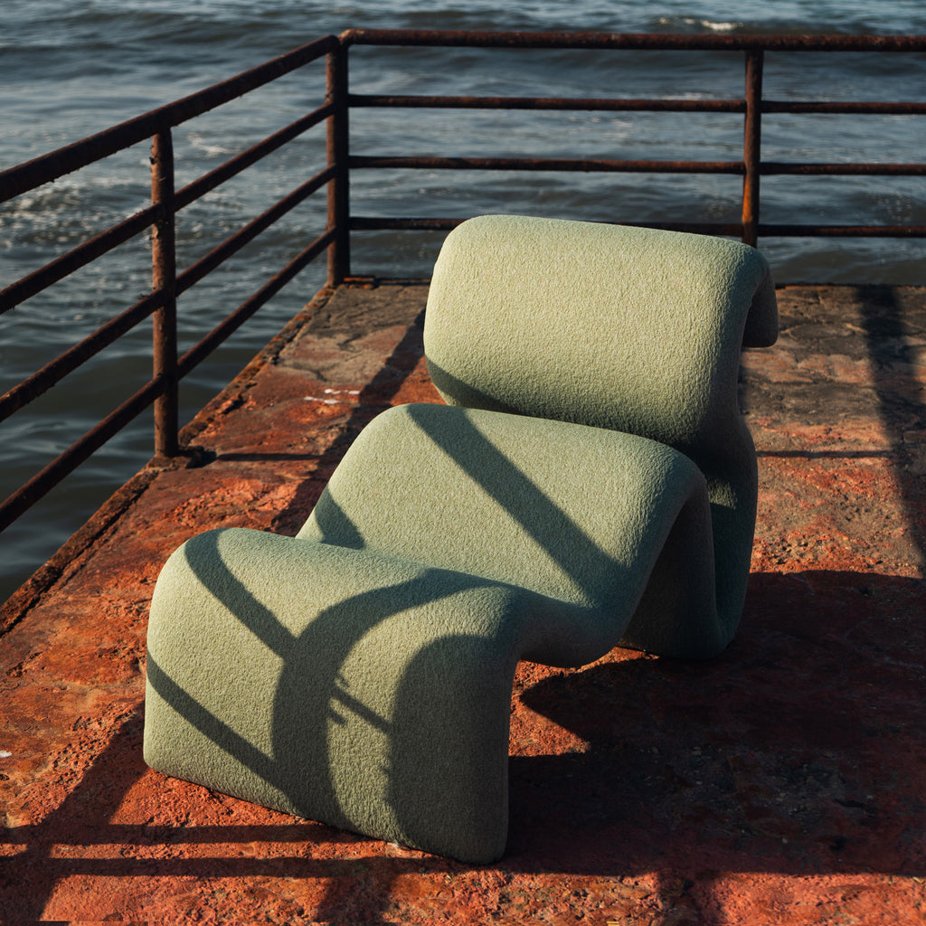 Swale Chair seen from a distance, showing the full outline of the chair.